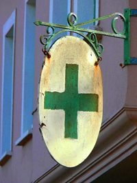 Old German Pharmacy Sign With Green Cross