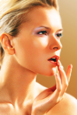 Beautiful Woman Applying Medical (USP) Lanolin Lip/Skin Balm to Her Lips