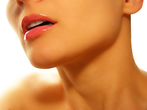 Woman's Moist Lips After Applying a Lanolin Skin Moisturizer